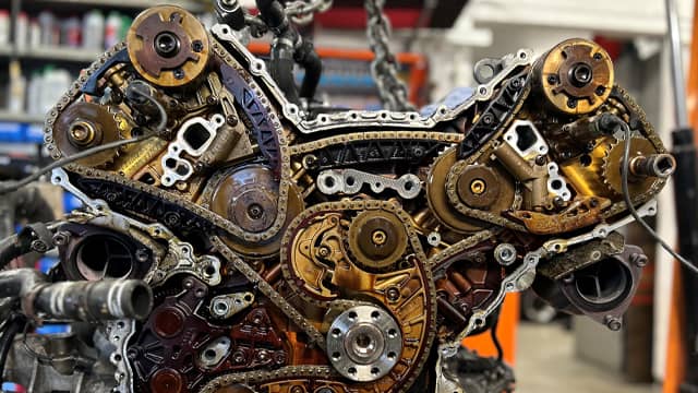 Timing chain replacement with the engine opened.