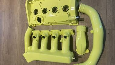 Powder coated engine components